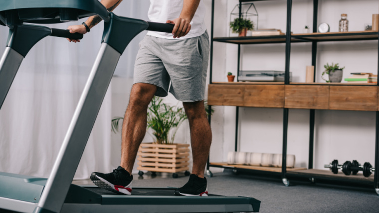 A person walking on a treadmill.