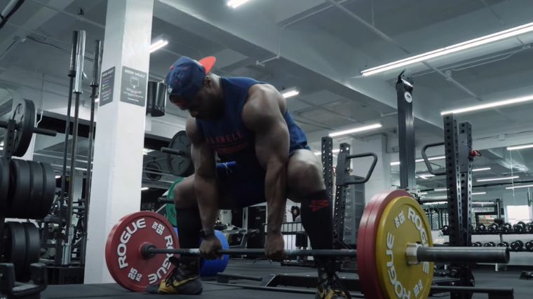 Powerlifter Kevin Oak sets up for the sumo deadlift.