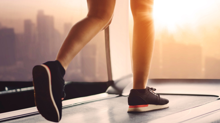 A person walking on a treadmill.