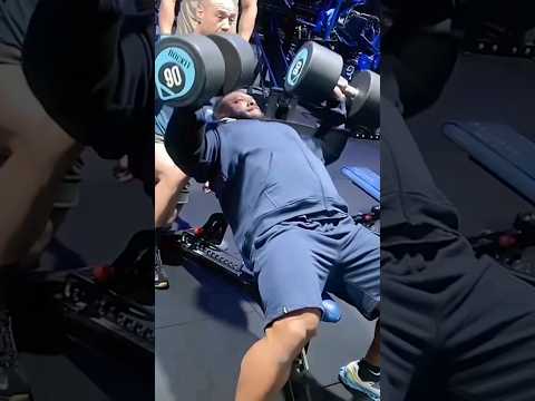 200 lbs dumbbells press . Nathan Pushing Hard